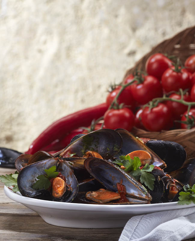 Ricetta di casa Agromonte: Pepata di cozze con salsa pronta di pomodoro ciliegino al peperoncino